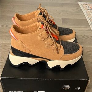 Sorel Tan and Black Winter Boots